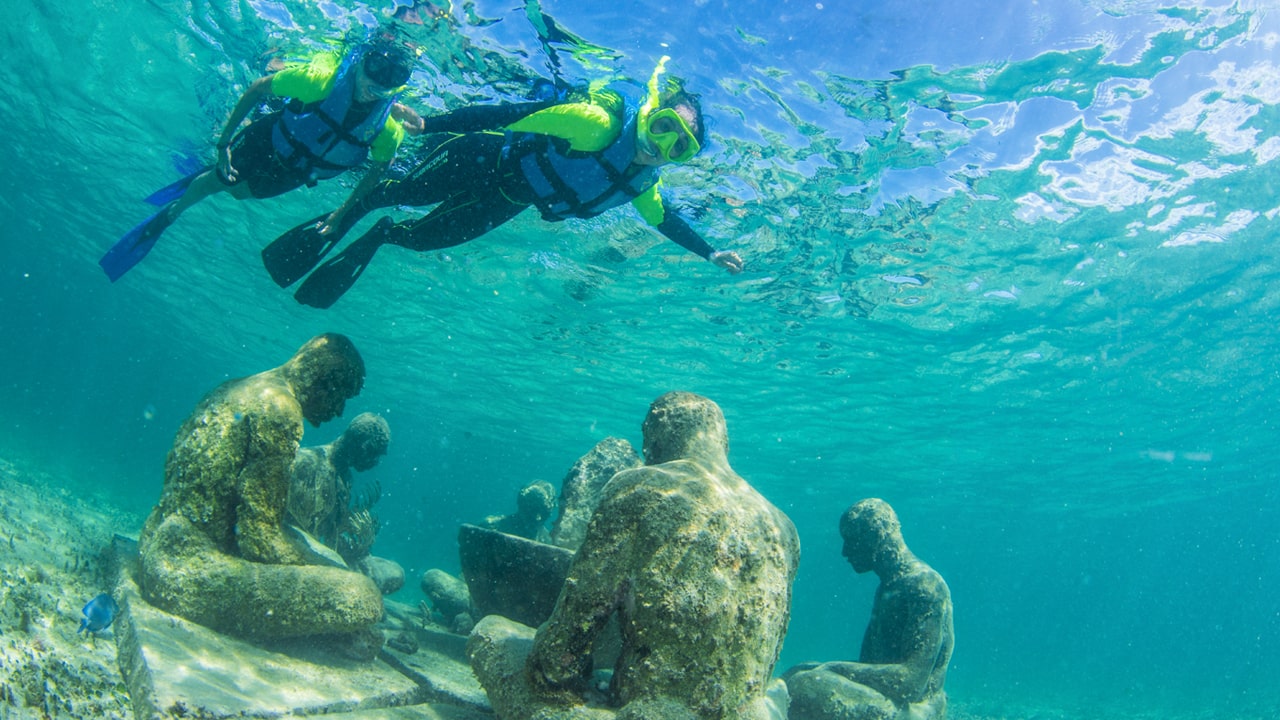 Go Snorkeling to MUSA the Underwater Museum in Isla Mujeres